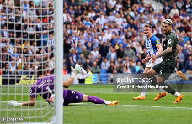 Evan Ferguson of Brighton & Hove Albion scores the team's second goal past sou1during the Premier League match between Brighton & Hove Albion and...