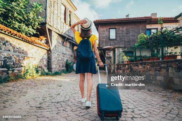 tourist woman traveling around europe - escapism stock pictures, royalty-free photos & images