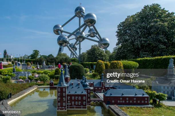 The Atomium is seen from the scale models of European cities of the "Mini Europe" tourist attraction located just a few metres from the monument on...