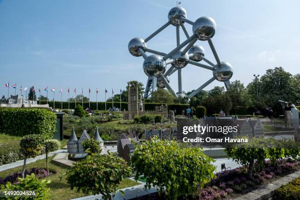The Atomium is seen from the scale models of European cities of the "Mini Europe" tourist attraction located just a few metres from the monument on...