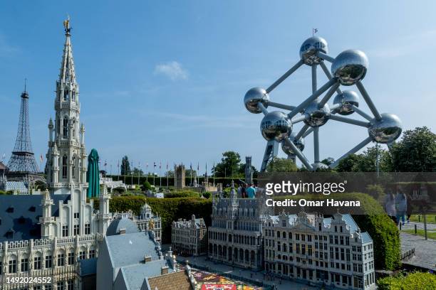 The Atomium can be seen from the scale model of the Grand Place de Bruxelles which is part of the "Mini Europe" tourist attraction located just a few...