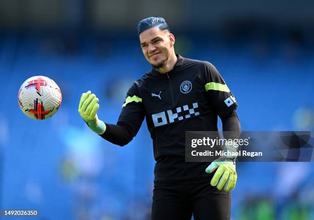 Ederson of Manchester City is seen with blue hair during the warm up prior to the Premier League match between Manchester City and Chelsea FC at...