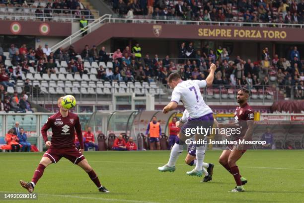 Luka Jovic of ACF Fiorentina scores with a header to give the side a 1-0 lead during the Serie A match between Torino FC and ACF Fiorentina at Stadio...