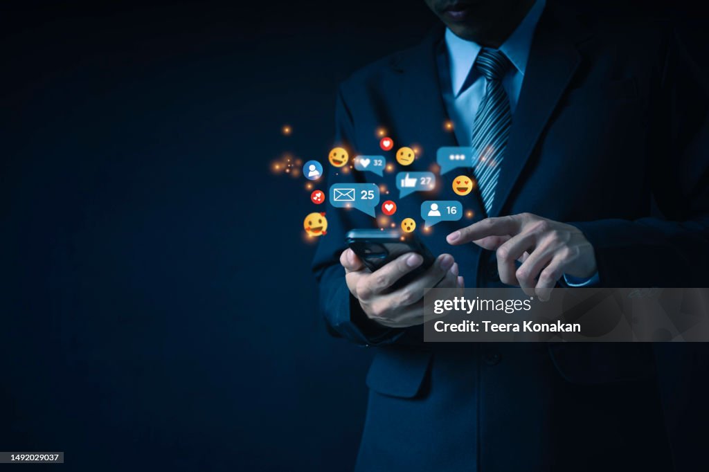 Using mobile phone for online social media chatting.