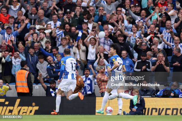 Pascal Gross of Brighton & Hove Albion celebrates after scoring the team's third goal during the Premier League match between Brighton & Hove Albion...