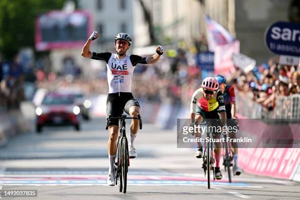 Brandon Mcnulty of The United States and UAE Team Emirates celebrates at finish line as stage winner ahead of Ben Healy of Ireland and Team EF...