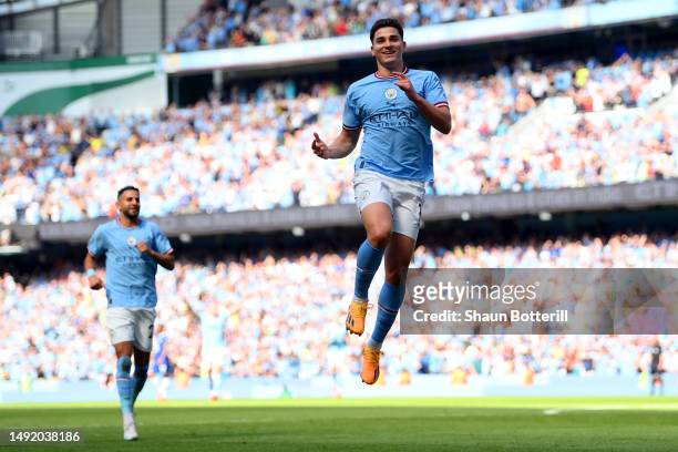 Julian Alvarez of Manchester City celebrates after scoring the team's first goal during the Premier League match between Manchester City and Chelsea...