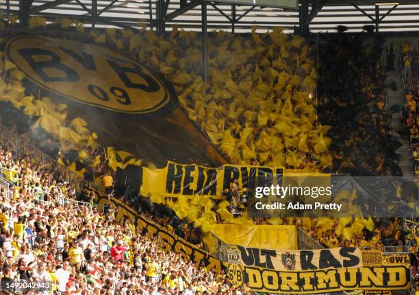 General view of fans of Borussia Dortmund showing their support prior to the Bundesliga match between FC Augsburg and Borussia Dortmund at WWK-Arena...