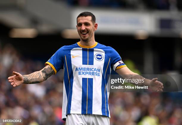 Lewis Dunk of Brighton & Hove Albion celebrates victory following the Premier League match between Brighton & Hove Albion and Southampton FC at...