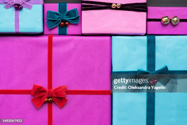 lots of gift boxes. packaging and preparation for the celebration. - wrapped stock pictures, royalty-free photos & images