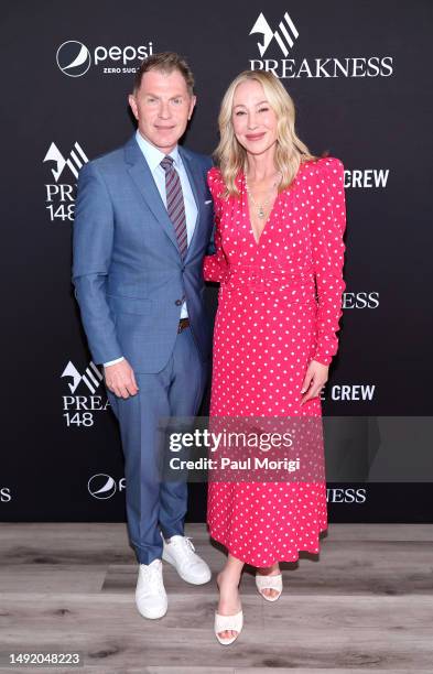 Bobby Flay and Belinda Stronach, Chairwoman, CEO and President, The Stronach Group and 1/ST attend Preakness 148 Hosted By 1/ST at Pimlico Race...