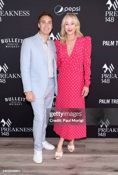 Austin Criden and Belinda Stronach, Chairwoman, CEO and President, The Stronach Group and 1/ST attends Preakness 148 In The 1/ST Chalet Hosted By...