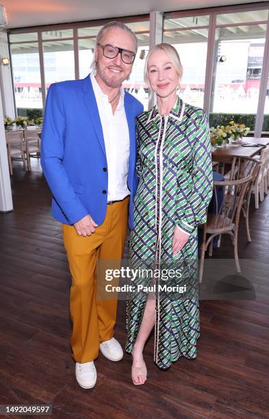 Paul Venoit and Belinda Stronach, Chairwoman, CEO and President, The Stronach Group and 1/ST attend Black-Eyed Susan Day hosted by 1/ST at Pimlico...