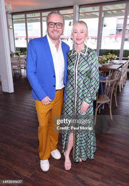 Paul Venoit and Belinda Stronach, Chairwoman, CEO and President, The Stronach Group and 1/ST attend Black-Eyed Susan Day hosted by 1/ST at Pimlico...