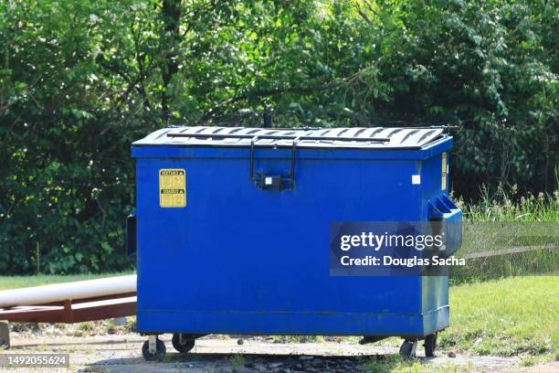 trash and refuse dumpster container - müllcontainer stock-fotos und bilder