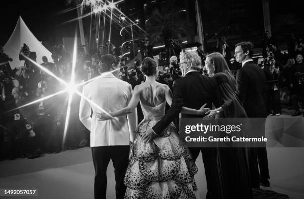 Charles Melton, Natalie Portman, Director Todd Haynes, Julianne Moore, and Cory Michael Smith attend the "May December" red carpet during the 76th...