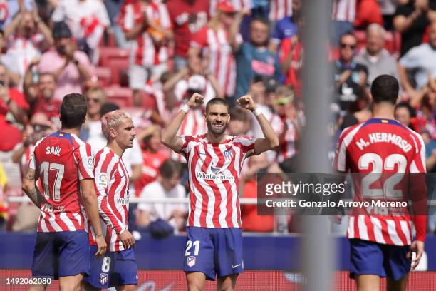 Yannick Carrasco of Atletico de Madrid celebrates scoring their opening goal with teammates Saul Niguez , Antoine Griezmann and Mario Hermoso during...