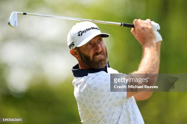 Dustin Johnson of the United States plays his shot from the third tee during the final round of the 2023 PGA Championship at Oak Hill Country Club on...