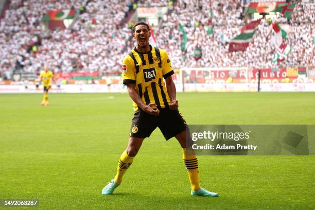 Sebastien Haller of Borussia Dortmund celebrates after scoring the team's second goal during the Bundesliga match between FC Augsburg and Borussia...