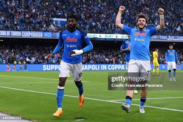 Andre-Frank Zambo Anguissa of SSC Napoli celebrates with teammate Khvicha Kvaratskhelia after scoring the team's first goal during the Serie A match...