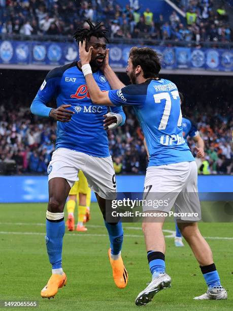 Andre-Frank Zambo Anguissa of SSC Napoli celebrates with teammate Khvicha Kvaratskhelia after scoring the team's first goal during the Serie A match...