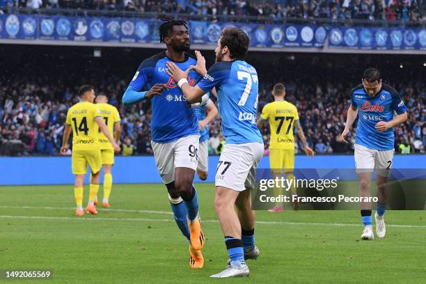 Andre-Frank Zambo Anguissa of SSC Napoli celebrates with teammate Khvicha Kvaratskhelia after scoring the team's first goal during the Serie A match...