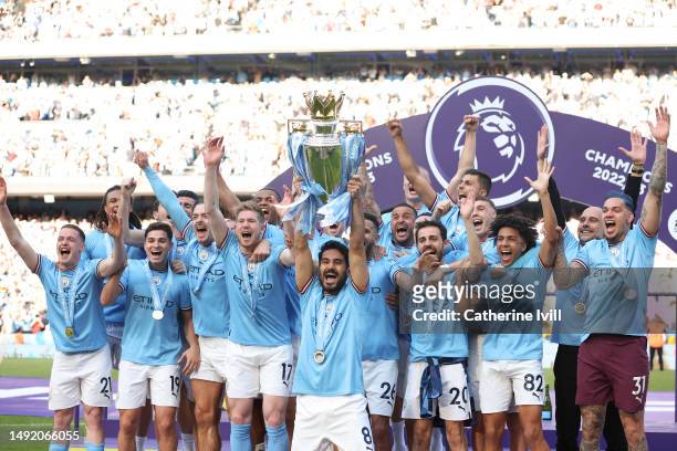 Ilkay Guendogan of Manchester City lifts the Premier League trophy following the Premier League match between Manchester City and Chelsea FC at...