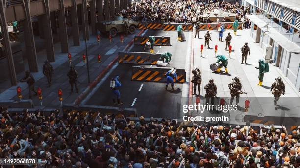 biohazard danger in modern city with crowds of people - crowd barricade stock pictures, royalty-free photos & images