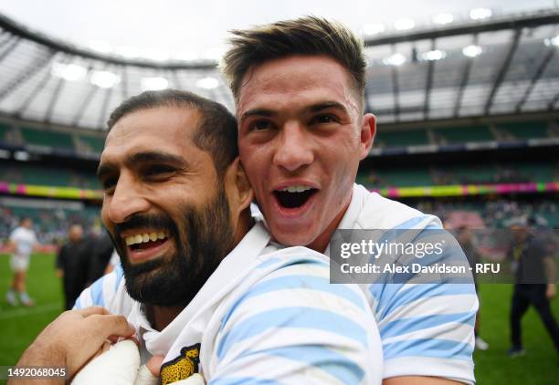 Marcos Moneta and Gaston Revol of Argentina celebrate after victory in the Cup Final between Argentina and Fiji the during Day Two of The HSBC London...