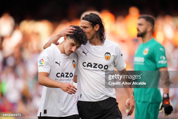 Diego Lopez and Edinson Cavani of Valencia CF leave the pitch during the LaLiga Santander match between Valencia CF and Real Madrid CF at Estadio...