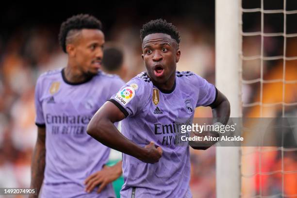 Vinicius Junior of Real Madrid reacts after receiving Racist abuse via gestures made by fans during the LaLiga Santander match between Valencia CF...