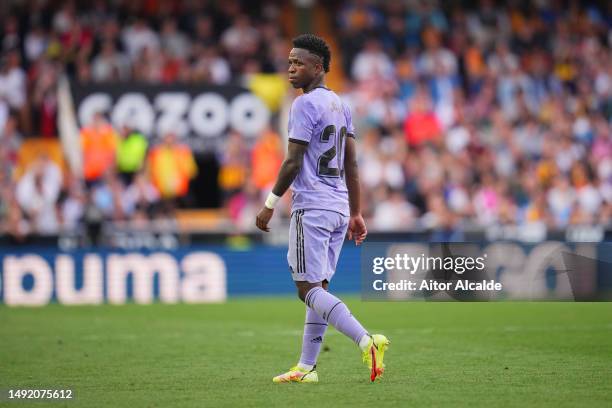 Vinicius Junior of Real Madrid looks on during the LaLiga Santander match between Valencia CF and Real Madrid CF at Estadio Mestalla on May 21, 2023...