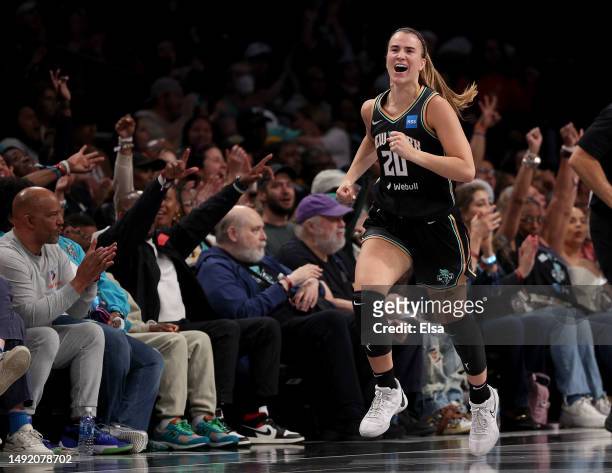 Sabrina Ionescu of the New York Liberty celebrates her three point shot in the second quarter against the Indiana Fever at Barclays Center on May 21,...