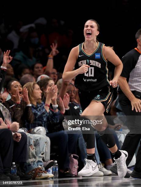 Sabrina Ionescu of the New York Liberty celebrates her three point shot in the second quarter against the Indiana Fever at Barclays Center on May 21,...