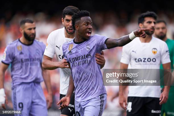 Vinicius Junior of Real Madrid argues during the LaLiga Santander match between Valencia CF and Real Madrid CF at Estadio Mestalla on May 21, 2023 in...