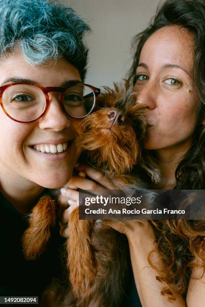 a woman couple and their dog portrait - charmig bildbanksfoton och bilder