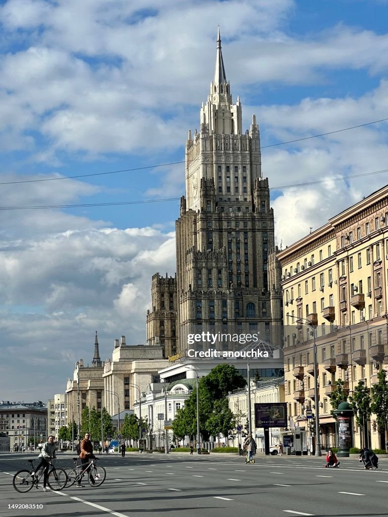 Ministry of Foreign Affairs of Russian Federation and cyclists on the street, Moscow, Russia