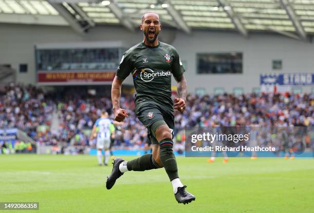 Theo Walcott of Southampton celebrates after scoring a goal that was later ruled out by VAR for offside during the Premier League match between...