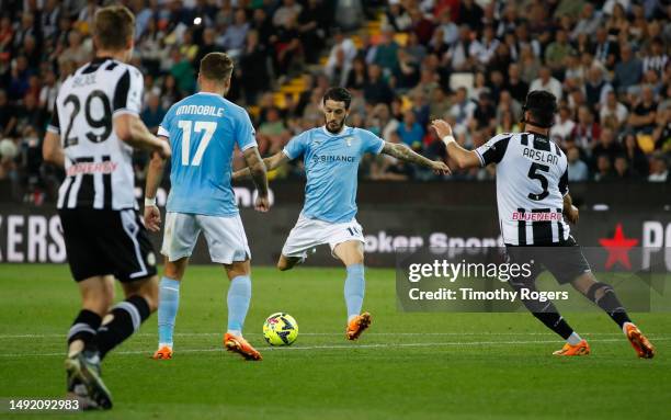 Luis Alberto of Lazio takes a long range shot at goal during the Serie A match between Udinese Calcio and SS Lazio at Dacia Arena on May 21, 2023 in...