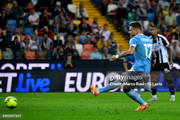 Ciro Immobile of SS Lazio scores a goal a penalty during the Serie A match between Udinese Calcio and SS Lazio at Dacia Arena on May 21, 2023 in...