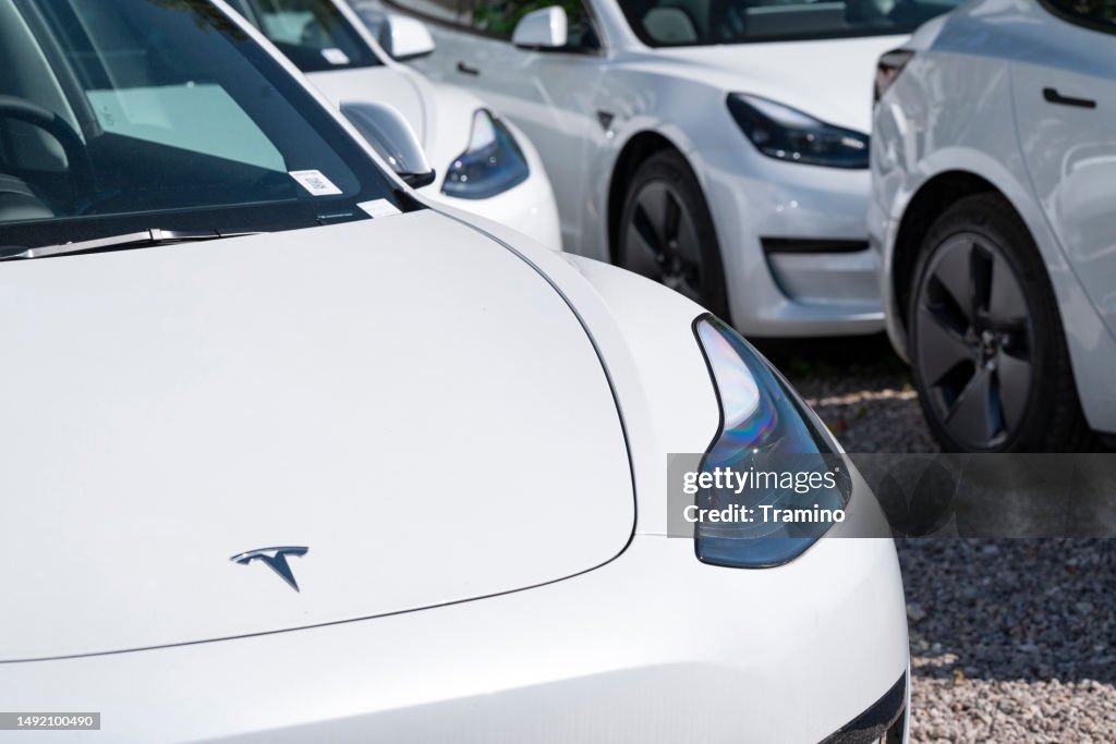 White electric cars on a parking
