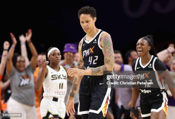 Brittney Griner of the Phoenix Mercury reacts after scoring and drawing a foul against the Chicago Sky during the first half of the WNBA game at...