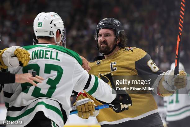 Mark Stone of the Vegas Golden Knights fights with Esa Lindell of the Dallas Stars during the second period in Game Two of the Western Conference...