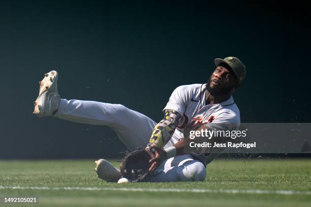 Akil Baddoo of the Detroit Tigers can't catch a ball hit by Riley Adams of the Washington Nationals during the seventh inning at Nationals Park on...