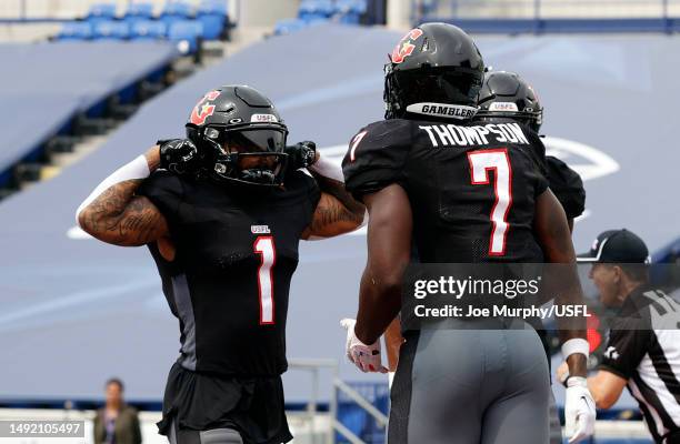 Mark Thompson of the Houston Gamblers celebrates with Anthony Ratliff-Williams after a touchdown during the first half of the game against the New...