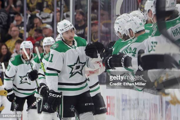 Jason Robertson of the Dallas Stars celebrates a power-play goal against the Vegas Golden Knights with teammates on the bench during the second...