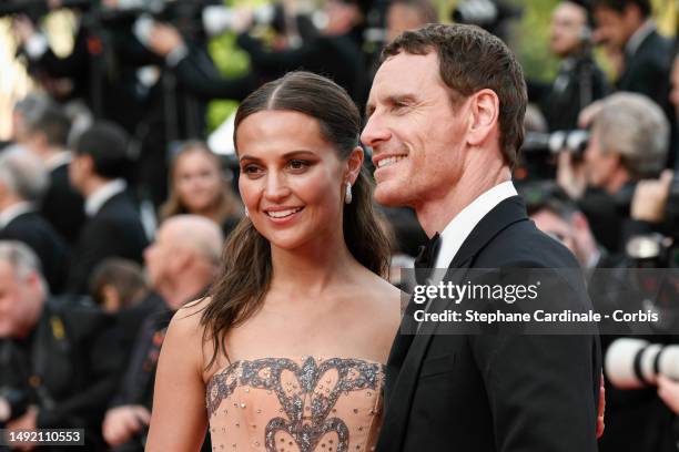 Alicia Vikander and Michael Fassbender attend the "Firebrand " red carpet during the 76th annual Cannes film festival at Palais des Festivals on May...