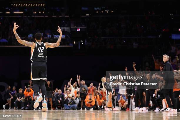 Brittney Griner of the Phoenix Mercury reacts after hitting a three-point shot against the Chicago Sky during the second half of the WNBA game at...