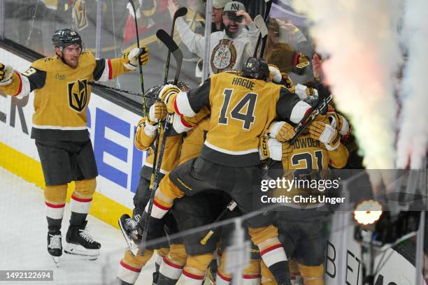 Chandler Stephenson of the Vegas Golden Knights celebrates his game-winning overtime goal against the Dallas Stars with teammates in Game Two of the...
