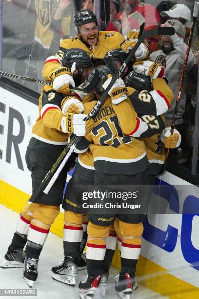 Chandler Stephenson of the Vegas Golden Knights celebrates his game-winning overtime goal against the Dallas Stars with teammates in Game Two of the...